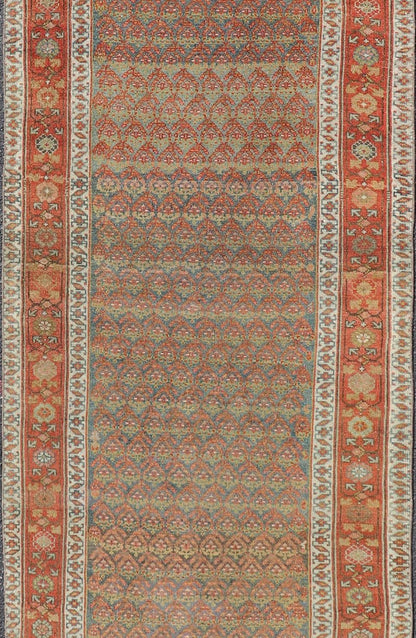 Antique Persian Hamadan Gallery Runner in Wool with All - Over Tribal Design Measures: 3'6 x 12'8 This antique Persian Hamadan rug has been hand - knotted in wool and features an all - over sub - geometric design rendered in red's, pink, green, ... - Keivan Woven ArtsEMB - 9700 - P13882 - 16552Rug