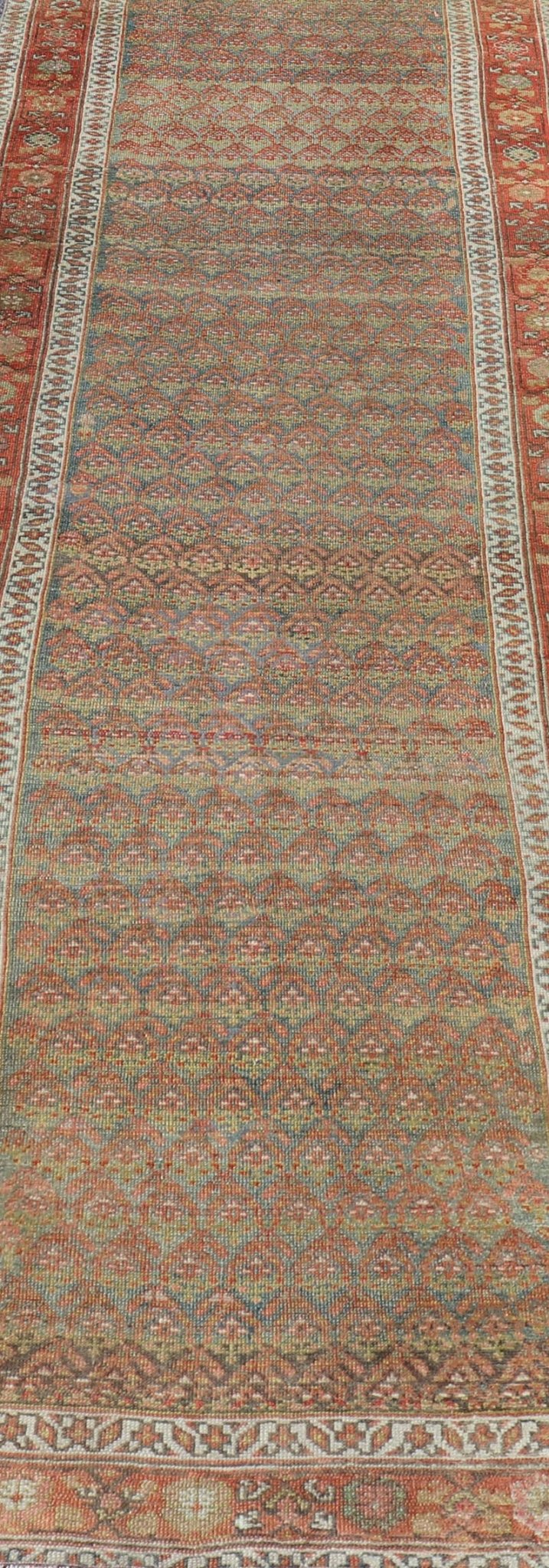 Antique Persian Hamadan Gallery Runner in Wool with All - Over Tribal Design Measures: 3'6 x 12'8 This antique Persian Hamadan rug has been hand - knotted in wool and features an all - over sub - geometric design rendered in red's, pink, green, ... - Keivan Woven ArtsEMB - 9700 - P13882 - 16552Rug