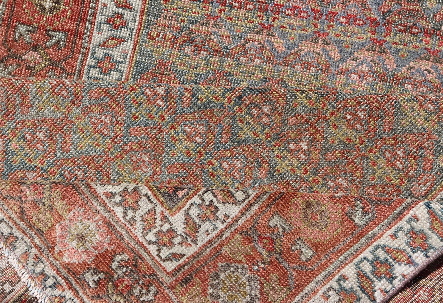 Antique Persian Hamadan Gallery Runner in Wool with All - Over Tribal Design Measures: 3'6 x 12'8 This antique Persian Hamadan rug has been hand - knotted in wool and features an all - over sub - geometric design rendered in red's, pink, green, ... - Keivan Woven ArtsEMB - 9700 - P13882 - 16552Rug