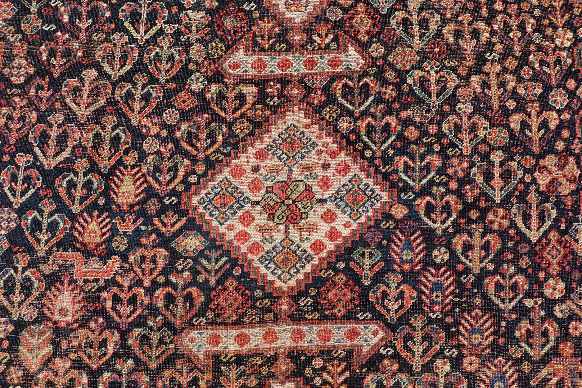 Measures: 7'1 x 9'9 Antique Persian Shiraz with All - Over Medallion Design in Ink Blue and Red. Keivan Woven Arts; rug EMB - 9703 - 13459, country of origin / type: Iran / Shiraz, circa 1920. This antique Persian Shiraz rug has been hand - knotted ... - Keivan Woven ArtsEMB - 9703 - 13459 - 16430Rug