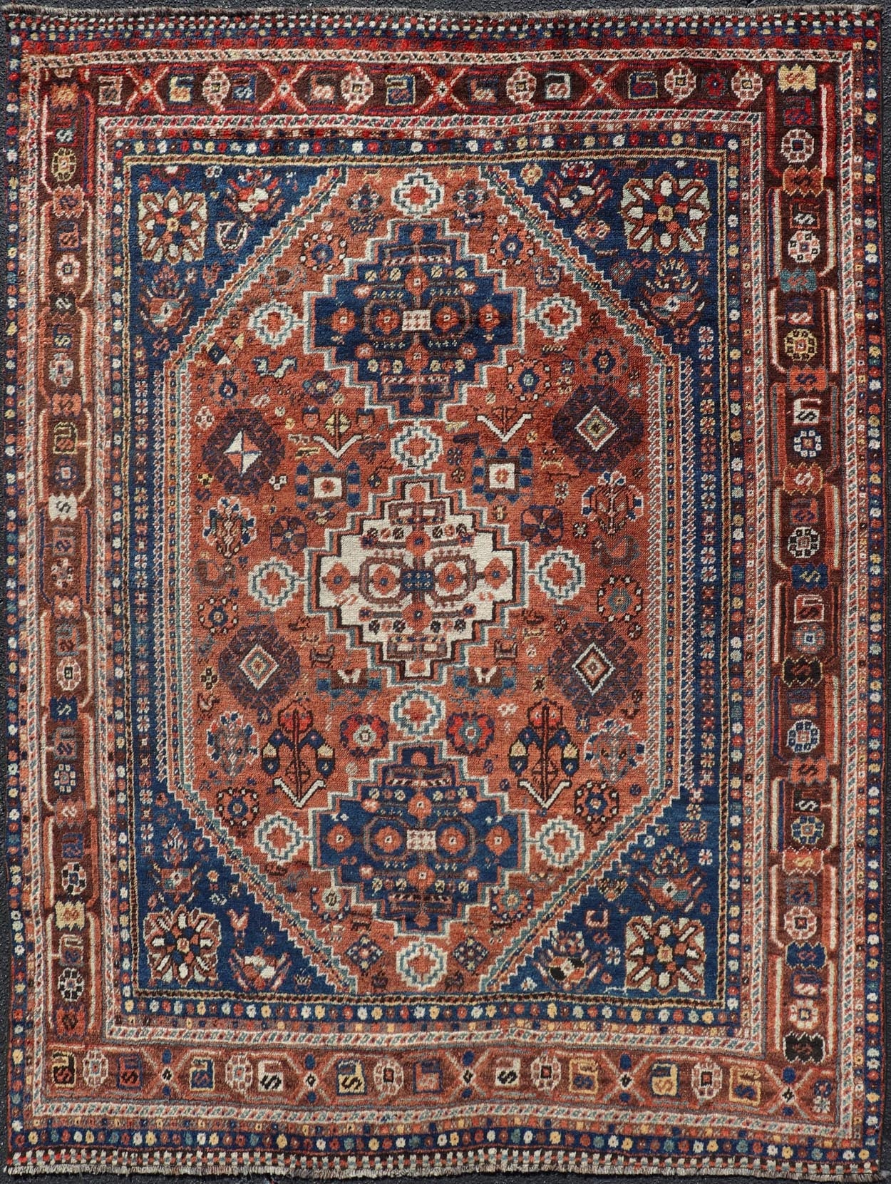 Antique Persian Shiraz Rug Tri - Medallion Geometrics in Rusty Orange and Blue Persian Shiraz antique rug in blue and brunt orange with Medallion geometric design, Keivan Woven Arts / rug EMB - 9706 - P13456, country of origin / type: Iran / Shiraz, c... - Keivan Woven ArtsEMB - 9706 - P13456 - 16448Rug
