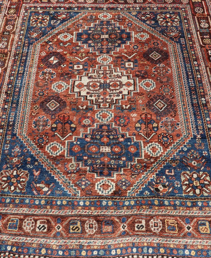 Antique Persian Shiraz Rug Tri - Medallion Geometrics in Rusty Orange and Blue Persian Shiraz antique rug in blue and brunt orange with Medallion geometric design, Keivan Woven Arts / rug EMB - 9706 - P13456, country of origin / type: Iran / Shiraz, c... - Keivan Woven ArtsEMB - 9706 - P13456 - 16448Rug