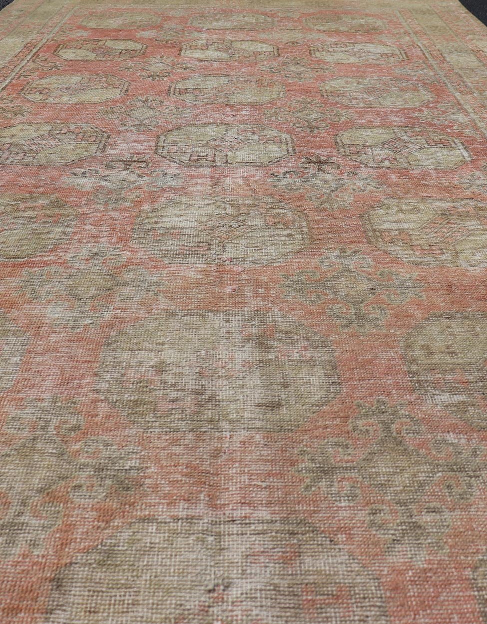 Antique Khotan Rug in Elephant Feet Design by Keivan Woven Arts Measures: 5'4 x 10'8 Antique Khotan Rug by Keivan Woven Arts with Repeating Medallion in elephant design. rug EMB - 9709, country of origin / type: Turkistan / tribal, circa... - Keivan Woven ArtsEMB - 9709 - 13821 - 16460Rug