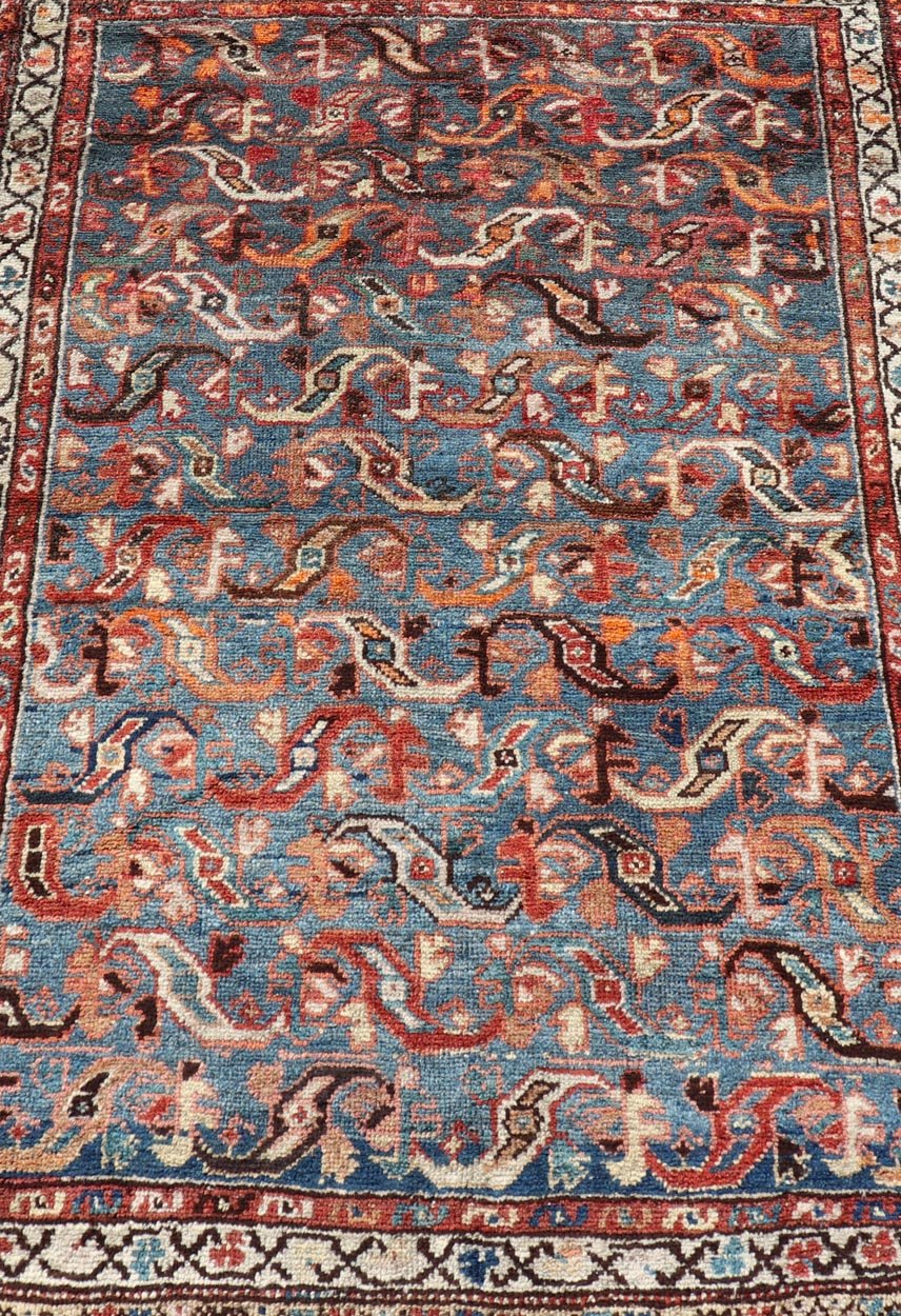 Antique Persian Malayer Rug with a Blue Field and Stylized Tribal Design Antique Persian Malayer rug with blue field and tribal motif design, Keivan Woven Arts / rug/EMB - 9716 - P13895, country of origin / type: Iran / Malayer, circa 1920. ... - Keivan Woven ArtsEMB - 9716 - P13895 - 16490Rug