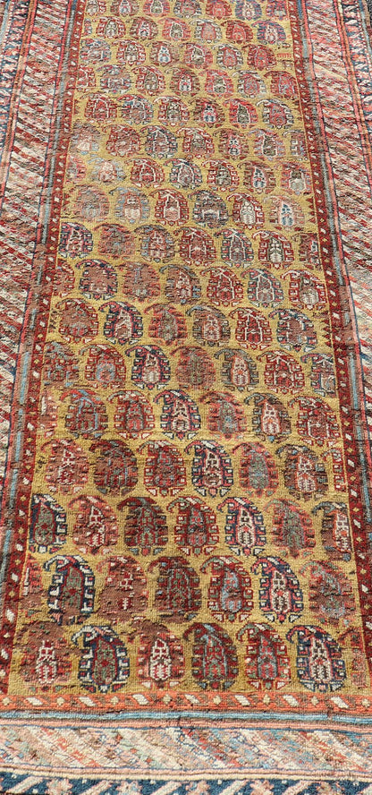 Antique Caucasian Kazak Runner with Paisley Design. Keivan Woven Arts; rug/ EMBC - 9617 - 13852 / Persian Rug, Country of Origin: Caucasus Type: Kazak Design: All - Over, Sub - Geometric, Kazak in Paisley design Measures: 3'6 x 8'3 This gorgeous ye... - Keivan Woven ArtsEMBC - 9617 - 13852 - 15947Rug