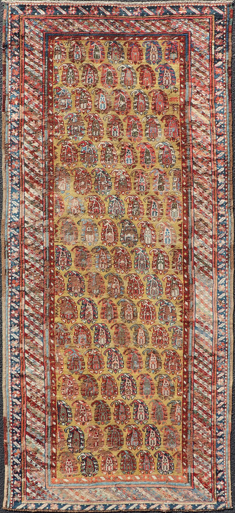 Antique Caucasian Kazak Runner with Paisley Design. Keivan Woven Arts; rug/ EMBC - 9617 - 13852 / Persian Rug, Country of Origin: Caucasus Type: Kazak Design: All - Over, Sub - Geometric, Kazak in Paisley design Measures: 3'6 x 8'3 This gorgeous ye... - Keivan Woven ArtsEMBC - 9617 - 13852 - 15947Rug