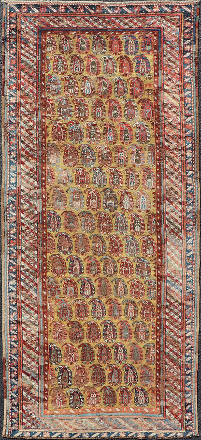 Antique Caucasian Kazak Runner with Paisley Design. Keivan Woven Arts; rug/ EMBC - 9617 - 13852 / Persian Rug, Country of Origin: Caucasus Type: Kazak Design: All - Over, Sub - Geometric, Kazak in Paisley design Measures: 3'6 x 8'3 This gorgeous ye... - Keivan Woven ArtsEMBC - 9617 - 13852 - 15947Rug