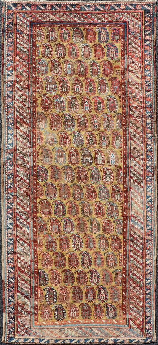 Antique Caucasian Kazak Runner with Paisley Design. Keivan Woven Arts; rug/ EMBC - 9617 - 13852 / Persian Rug, Country of Origin: Caucasus Type: Kazak Design: All - Over, Sub - Geometric, Kazak in Paisley design Measures: 3'6 x 8'3 This gorgeous ye... - Keivan Woven ArtsEMBC - 9617 - 13852 - 15947Rug