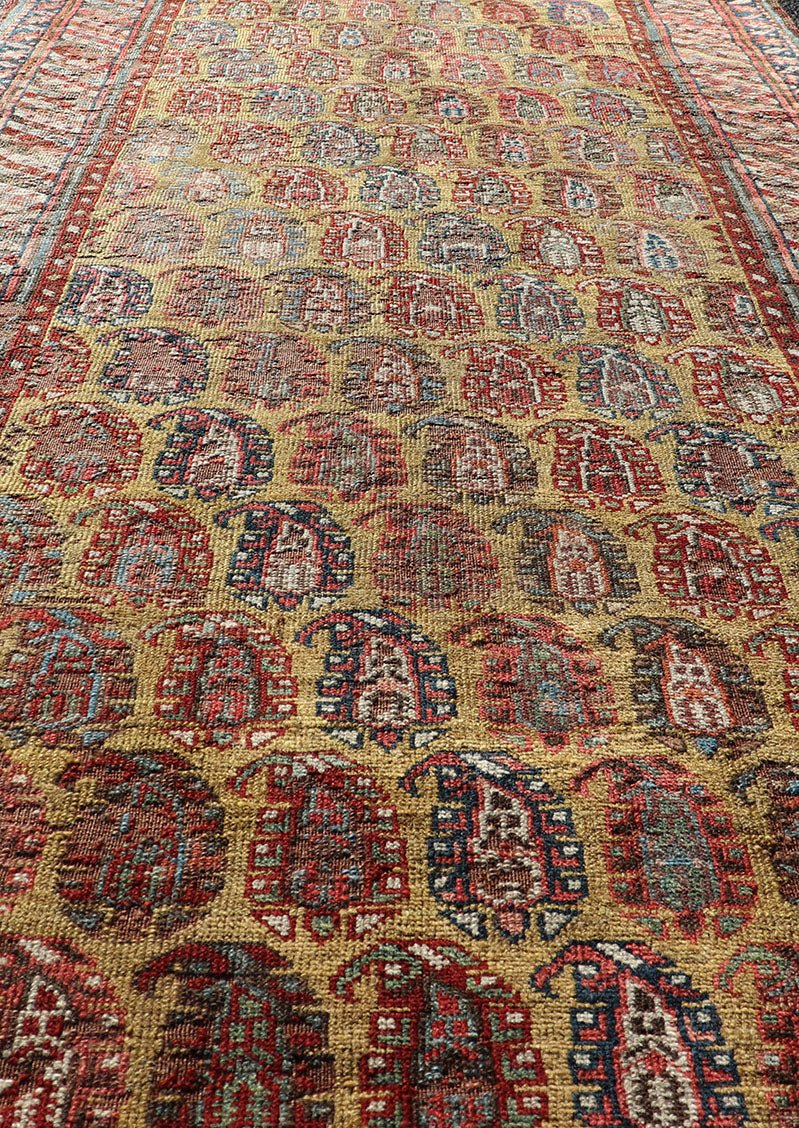 Antique Caucasian Kazak Runner with Paisley Design. Keivan Woven Arts; rug/ EMBC - 9617 - 13852 / Persian Rug, Country of Origin: Caucasus Type: Kazak Design: All - Over, Sub - Geometric, Kazak in Paisley design Measures: 3'6 x 8'3 This gorgeous ye... - Keivan Woven ArtsEMBC - 9617 - 13852 - 15947Rug