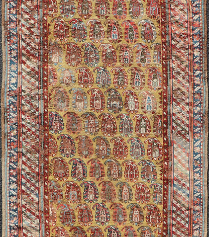 Antique Caucasian Kazak Runner with Paisley Design. Keivan Woven Arts; rug/ EMBC - 9617 - 13852 / Persian Rug, Country of Origin: Caucasus Type: Kazak Design: All - Over, Sub - Geometric, Kazak in Paisley design Measures: 3'6 x 8'3 This gorgeous ye... - Keivan Woven ArtsEMBC - 9617 - 13852 - 15947Rug
