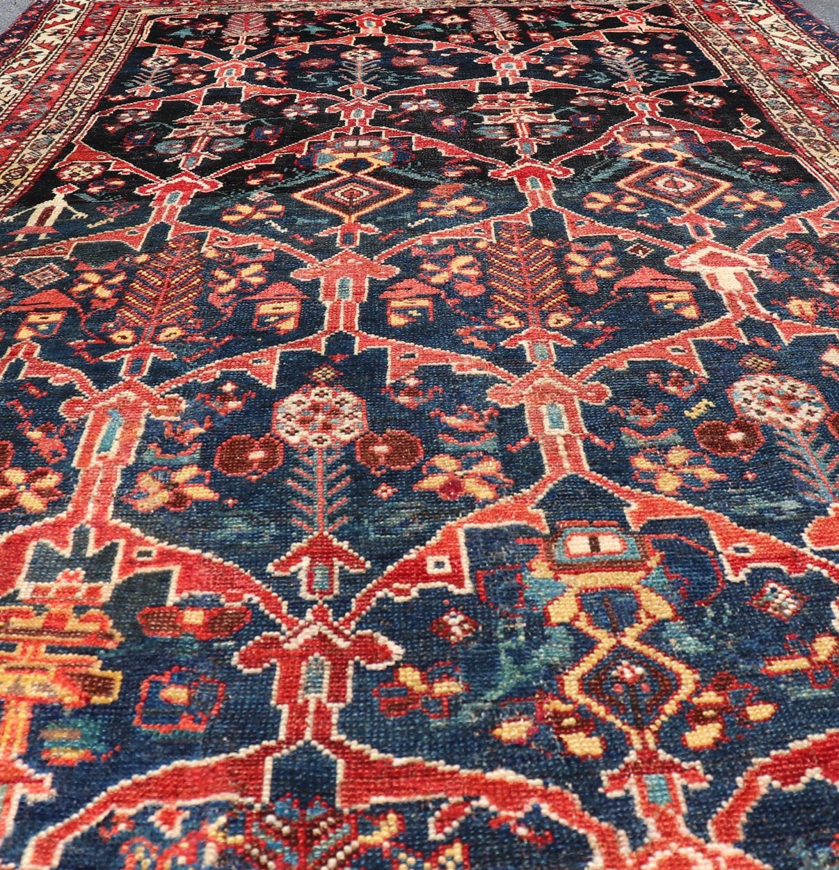 Antique Persian Bakhitari Colorful Rug with All - Over Floral Medallion Design. Keivan Woven Arts: rug EMB - 9695 - 13820; Antique Persian Rug, Antique Persian Antique Persian Floral Rug, Antique Bakhtiari. Measures: 4'8 x 8'4 This woven art features... - Keivan Woven ArtsEMBC - 9695 - 13820 - 16528Rug