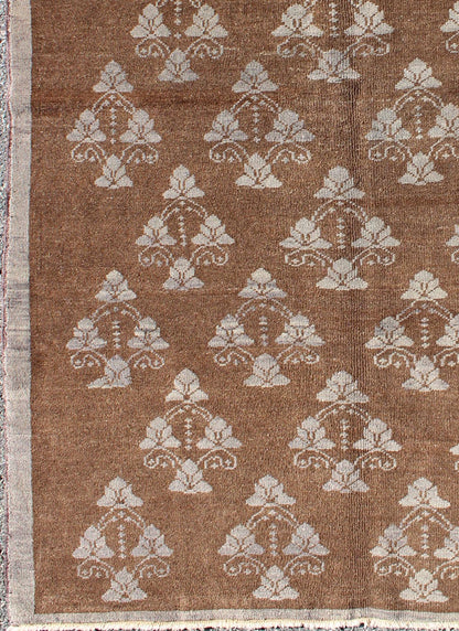 Vintage Turkish unique Oushak with Repeating Flowers Design. Measures: 4'6 x 6'10. This Vintage Oushak displays a chocolate brown background with Taupe/grey repeating motifs in the central field, all flanked by a surrounding solid border in Taupe... - Keivan Woven ArtsEN - 1005 - 3425Rug
