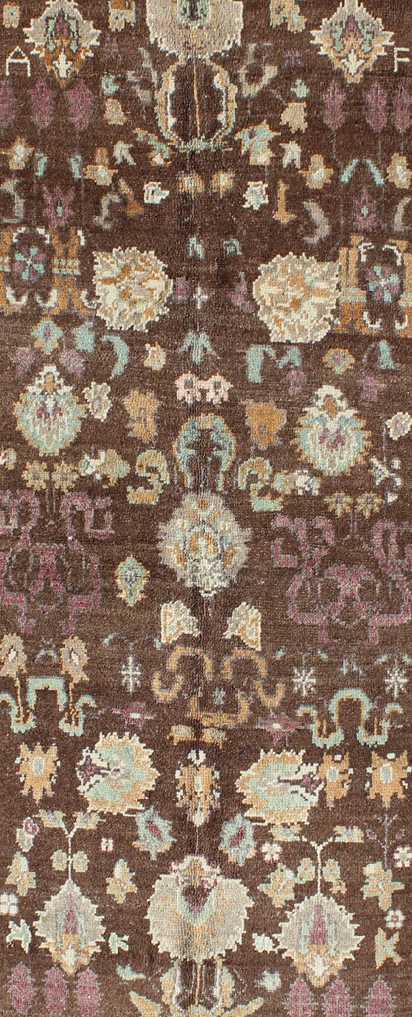 Vintage Turkish Oushak Rug in Brown Background with All - Over Floral Design Measures: 4'5 x 8'3 This Turkish Oushak is set on a chocolate - brown background and features a light gray/taupe border. The overall palette remains cool, with accent colors... - Keivan Woven ArtsEN - 1025 - 3844Rug
