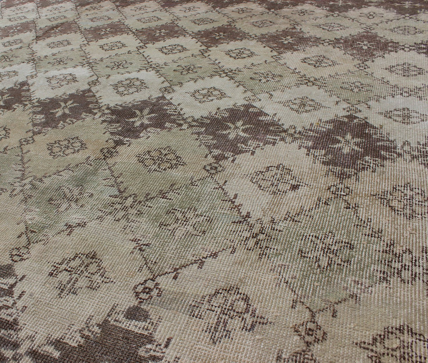 Vintage Distressed Rug with Diamond Modern Design in Earth Tones & Neutrals. This vintage Turkish Mid - Century Modern distressed rug is rendered in diamond pattern and a speckled assortment of taupe, light blue, muted green, Chocolate Brown and gray... - Keivan Woven ArtsEN - 1039 - 5279Rug