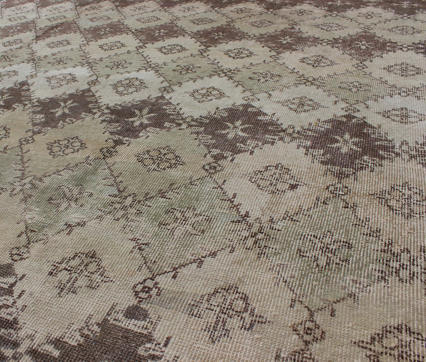 Vintage Distressed Rug with Diamond Modern Design in Earth Tones & Neutrals. This vintage Turkish Mid - Century Modern distressed rug is rendered in diamond pattern and a speckled assortment of taupe, light blue, muted green, Chocolate Brown and gray... - Keivan Woven ArtsEN - 1039 - 5279Rug