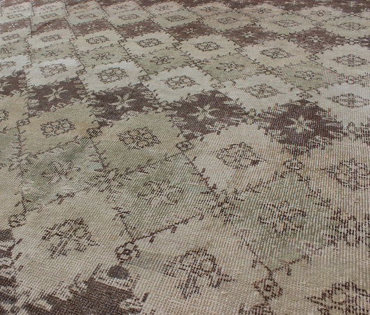 Vintage Distressed Rug with Diamond Modern Design in Earth Tones & Neutrals. This vintage Turkish Mid - Century Modern distressed rug is rendered in diamond pattern and a speckled assortment of taupe, light blue, muted green, Chocolate Brown and gray... - Keivan Woven ArtsEN - 1039 - 5279
