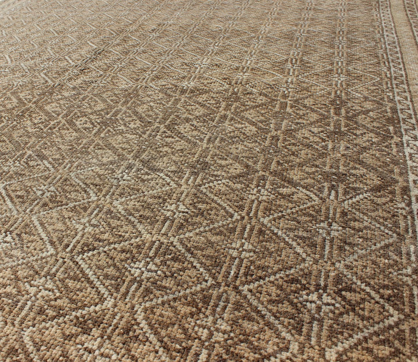 Rare Turkish Rug with Brown and Neutral Colors This piece is an impressive patterned and geometric rug that was handwoven during the first part of the 20th Century in Turkey. With an all - over diamond and lattice design, the color palette and des... - Keivan Woven ArtsEN - 1085 - 5448Rug