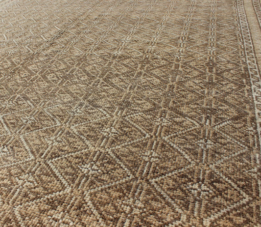 Rare Turkish Rug with Brown and Neutral Colors This piece is an impressive patterned and geometric rug that was handwoven during the first part of the 20th Century in Turkey. With an all - over diamond and lattice design, the color palette and des... - Keivan Woven ArtsEN - 1085 - 5448Rug