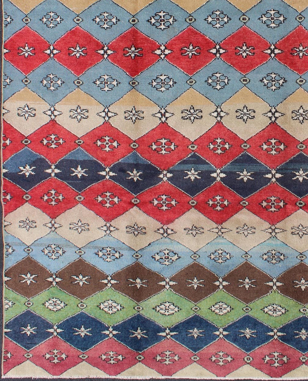 Mid - Century Rug Rendered with a multi - colored background and a spotted and speckled assortment of yellow, blue, green, red and brown colors, this very unique Mid Century rug has diamonds shapes that vary in color. Measures: 6`6 x 9` - Keivan Woven ArtsEN - 11037 - 5275Rug