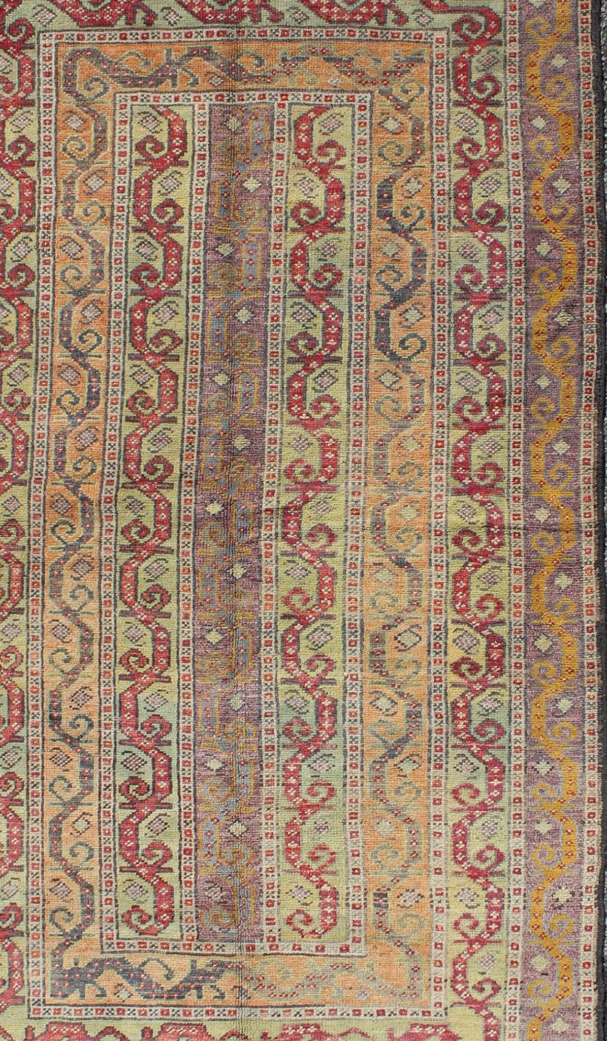 Antique Turkish Rug With Vertical Stripe Design in Light Green, Red, Light Orange and Purple. Measures: 3'7 x 6'6. With a multitude of stacking frames, the striking design as well as the unique color combination, this unique Turkish rug... - Keivan Woven ArtsEN - 1107 - 5283Rug