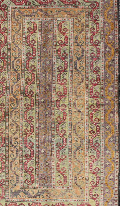 Antique Turkish Rug With Vertical Stripe Design in Light Green, Red, Light Orange and Purple. Measures: 3'7 x 6'6. With a multitude of stacking frames, the striking design as well as the unique color combination, this unique Turkish rug... - Keivan Woven ArtsEN - 1107 - 5283Rug