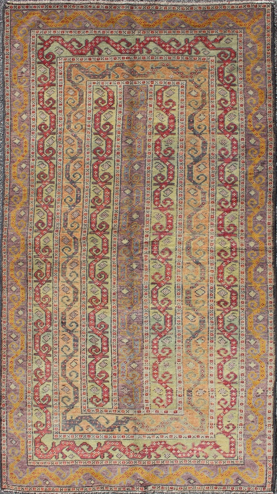 Antique Turkish Rug With Vertical Stripe Design in Light Green, Red, Light Orange and Purple. Measures: 3'7 x 6'6. With a multitude of stacking frames, the striking design as well as the unique color combination, this unique Turkish rug... - Keivan Woven ArtsEN - 1107 - 5283Rug