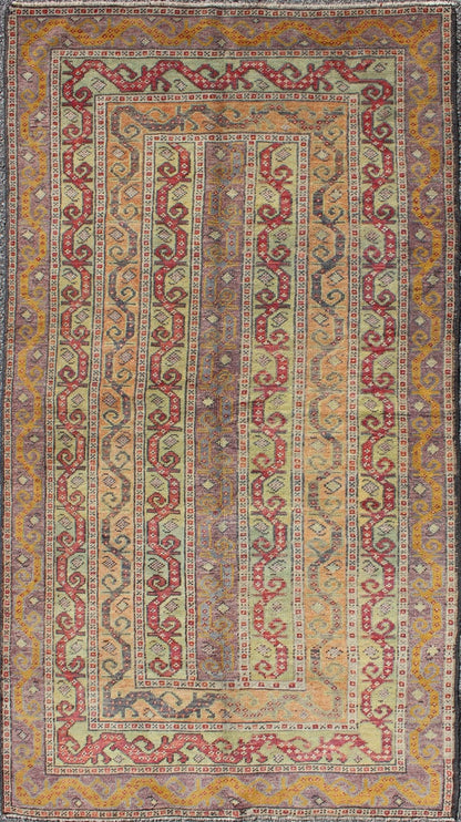Antique Turkish Rug With Vertical Stripe Design in Light Green, Red, Light Orange and Purple. Measures: 3'7 x 6'6. With a multitude of stacking frames, the striking design as well as the unique color combination, this unique Turkish rug... - Keivan Woven ArtsEN - 1107 - 5283Rug