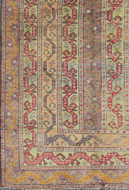 Antique Turkish Rug With Vertical Stripe Design in Light Green, Red, Light Orange and Purple. Measures: 3'7 x 6'6. With a multitude of stacking frames, the striking design as well as the unique color combination, this unique Turkish rug... - Keivan Woven ArtsEN - 1107 - 5283Rug