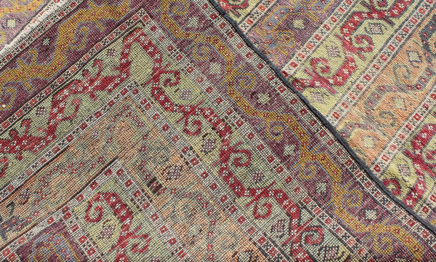 Antique Turkish Rug With Vertical Stripe Design in Light Green, Red, Light Orange and Purple. Measures: 3'7 x 6'6. With a multitude of stacking frames, the striking design as well as the unique color combination, this unique Turkish rug... - Keivan Woven ArtsEN - 1107 - 5283Rug