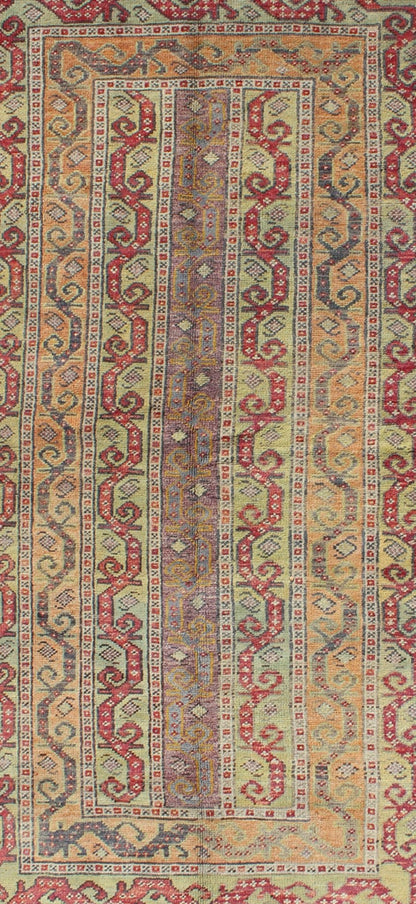 Antique Turkish Rug With Vertical Stripe Design in Light Green, Red, Light Orange and Purple. Measures: 3'7 x 6'6. With a multitude of stacking frames, the striking design as well as the unique color combination, this unique Turkish rug... - Keivan Woven ArtsEN - 1107 - 5283Rug