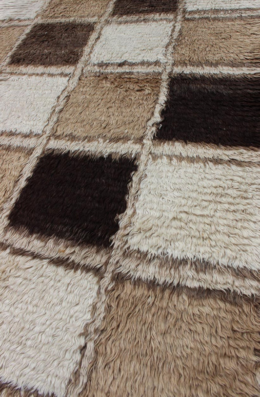 Mid Century Angora Wool Tulu This wonderful Turkish Tulu has a checkerboard pattern that is very unique. The colors are light brown, dark brown, tans, ivory, and light gray. A truly stunning piece. Measures: 4.0 x 7.7 - Keivan Woven ArtsEN - 112194 - 2770Rug