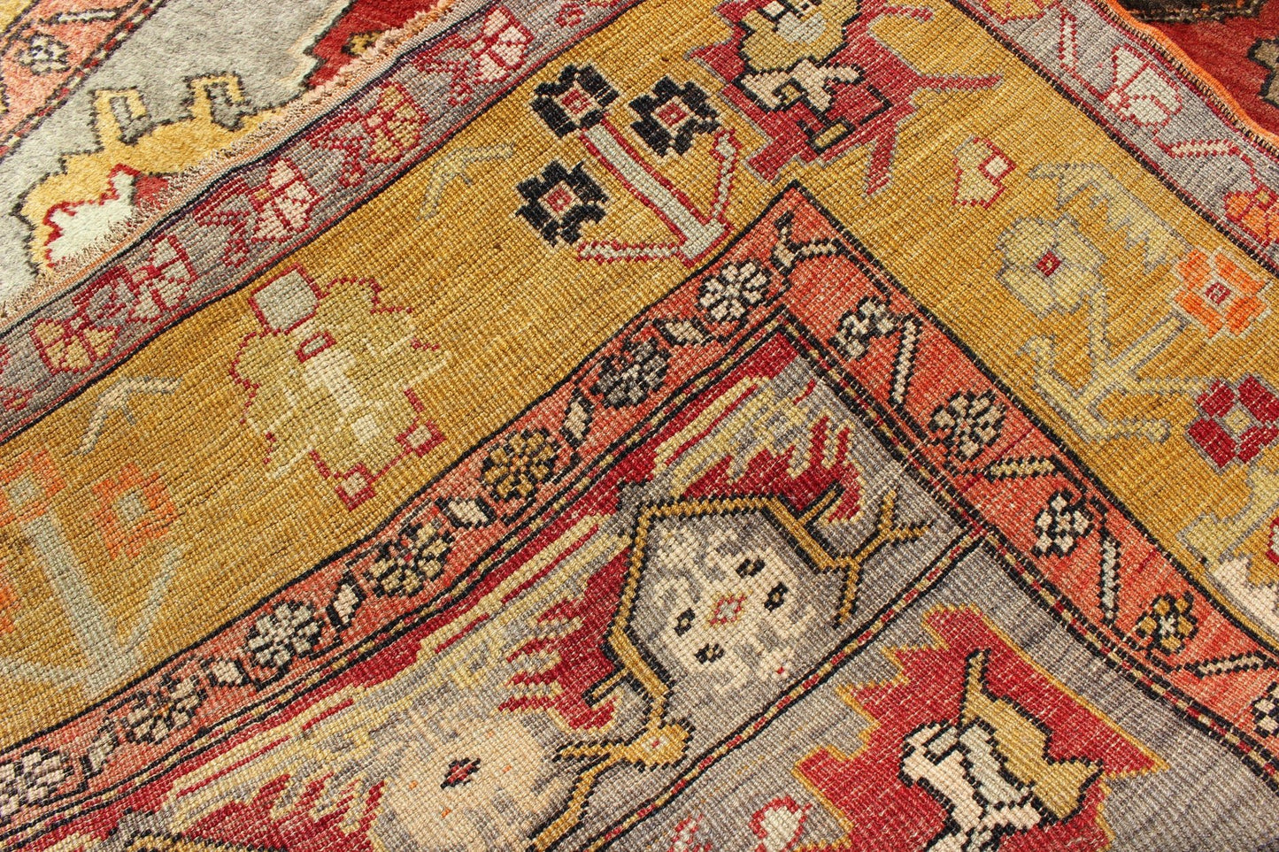 Turkish Antique Tribal Diamond Medallion Oushak Area Rug in Red and Gold Measures: 4'8 x 8'7 This beautiful Turkish Oushak is unique in its color palette. The center medallion features a combination of black, brown, gold, red and light ... - Keivan Woven ArtsEN - 112658 - 2699Rug