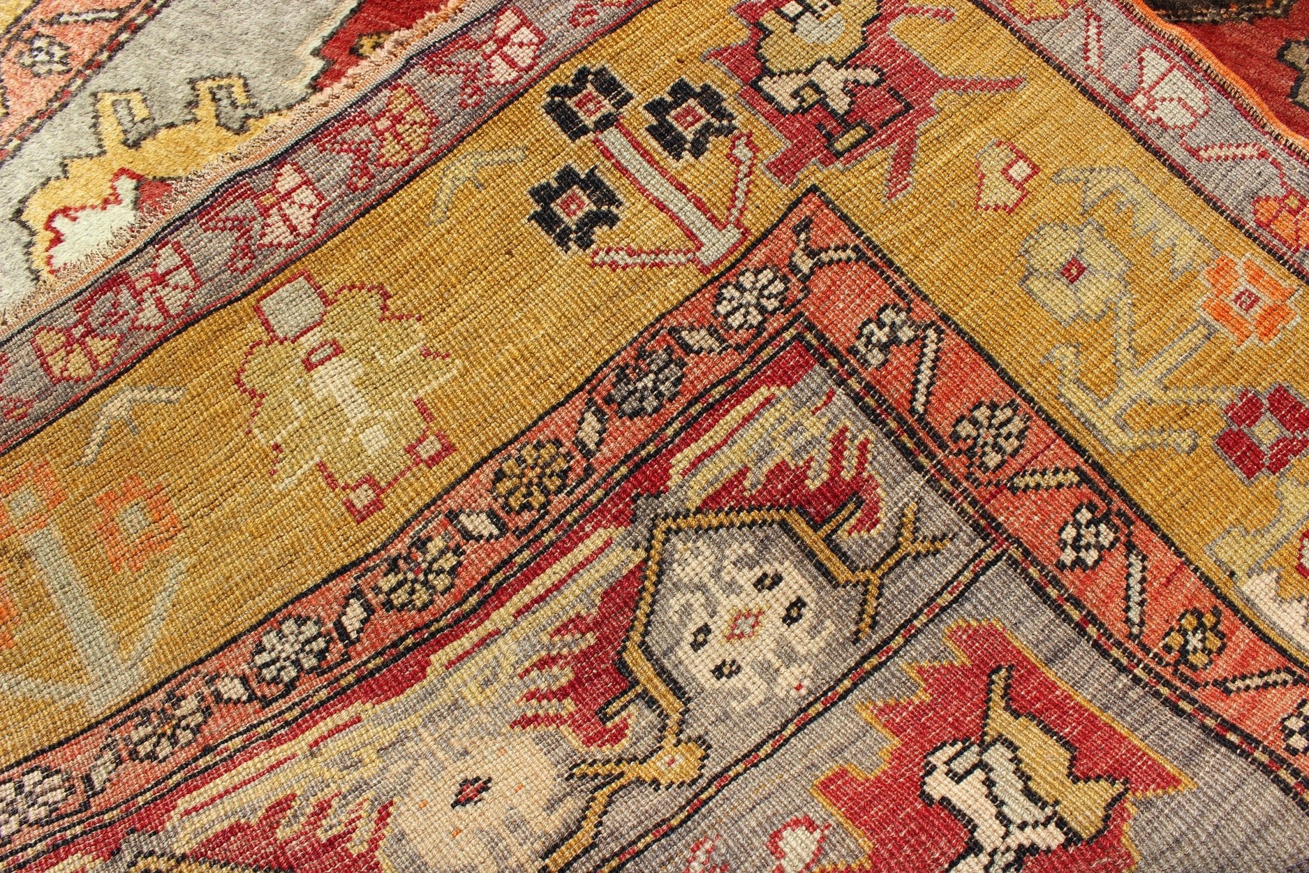 Turkish Antique Tribal Diamond Medallion Oushak Area Rug in Red and Gold Measures: 4'8 x 8'7 This beautiful Turkish Oushak is unique in its color palette. The center medallion features a combination of black, brown, gold, red and light ... - Keivan Woven ArtsEN - 112658 - 2699Rug