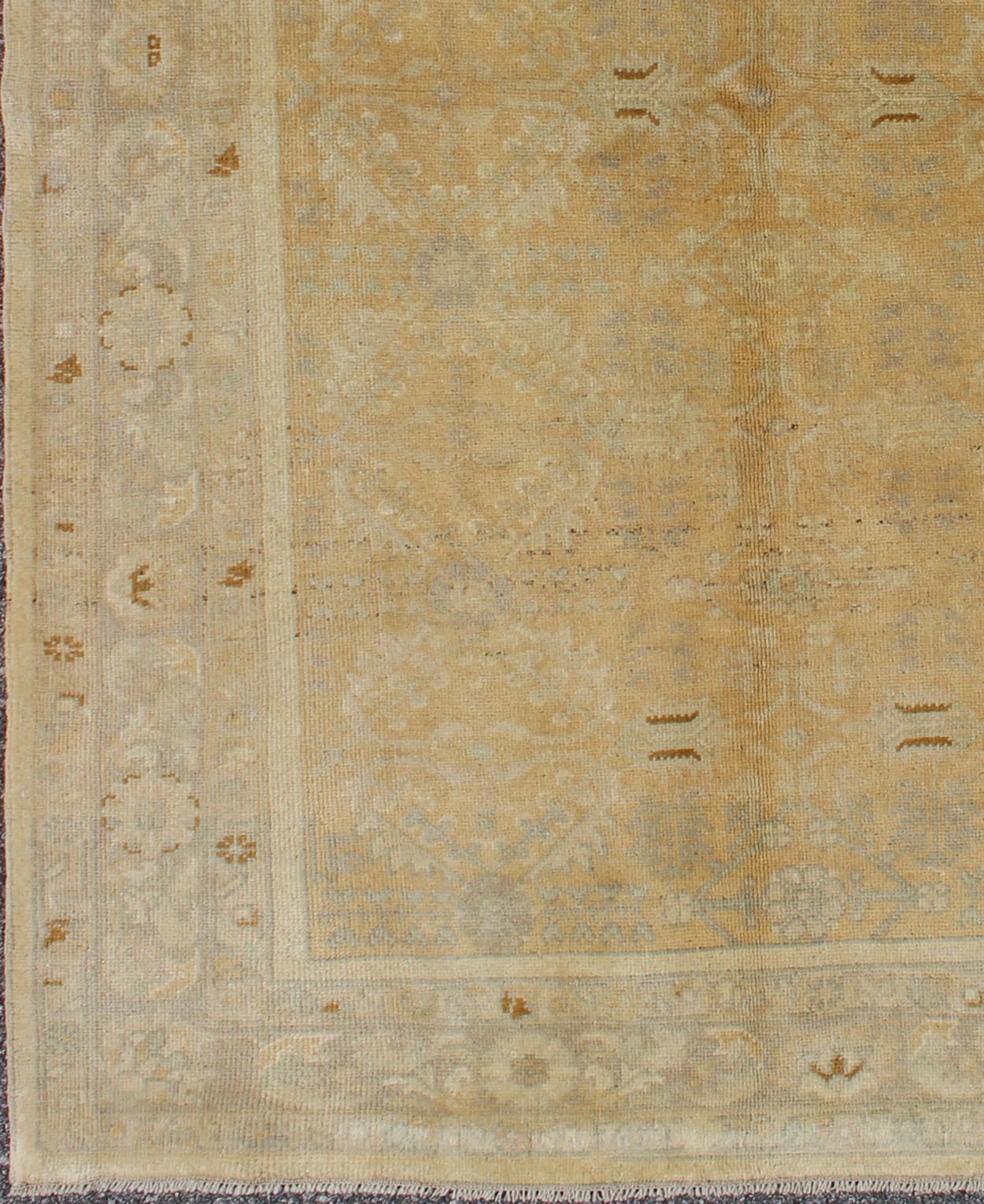 Multi - Medallion vintage Turkish Oushak rug with floral design, rug en - 112724, country of origin type: Turkey Oushak, circa 1940 This Oushak carpet (circa 1930) features an all - over pattern of interconnected, vertically - arranged medallion motifs.... - Keivan Woven ArtsEN - 112724 - 3453Rug