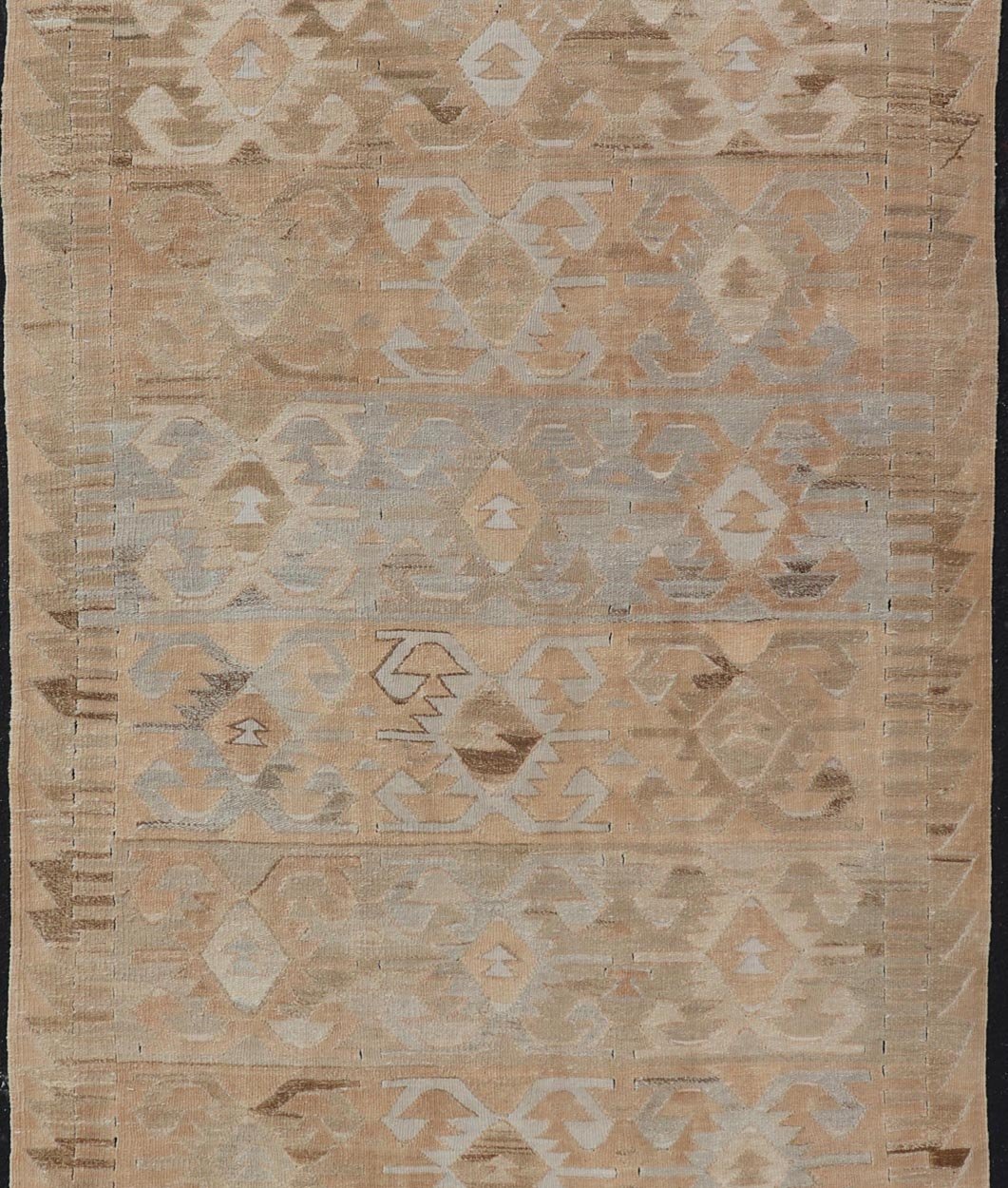 Gallery Turkish Vintage Flat - Weave Tribal Designed Kilim in Earthy Tones Measures: 5 x 10'1 This vintage Turkish flat weave Kilim features tribal relics and faded earthy neutrals. The repeating design covers the entire field of muted li... - Keivan Woven ArtsEN - 113 - 18782