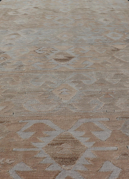 Gallery Turkish Vintage Flat - Weave Tribal Designed Kilim in Earthy Tones Measures: 5 x 10'1 This vintage Turkish flat weave Kilim features tribal relics and faded earthy neutrals. The repeating design covers the entire field of muted li... - Keivan Woven ArtsEN - 113 - 18782