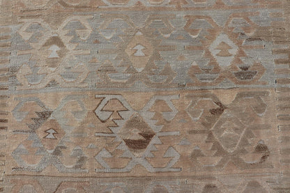 Gallery Turkish Vintage Flat - Weave Tribal Designed Kilim in Earthy Tones Measures: 5 x 10'1 This vintage Turkish flat weave Kilim features tribal relics and faded earthy neutrals. The repeating design covers the entire field of muted li... - Keivan Woven ArtsEN - 113 - 18782