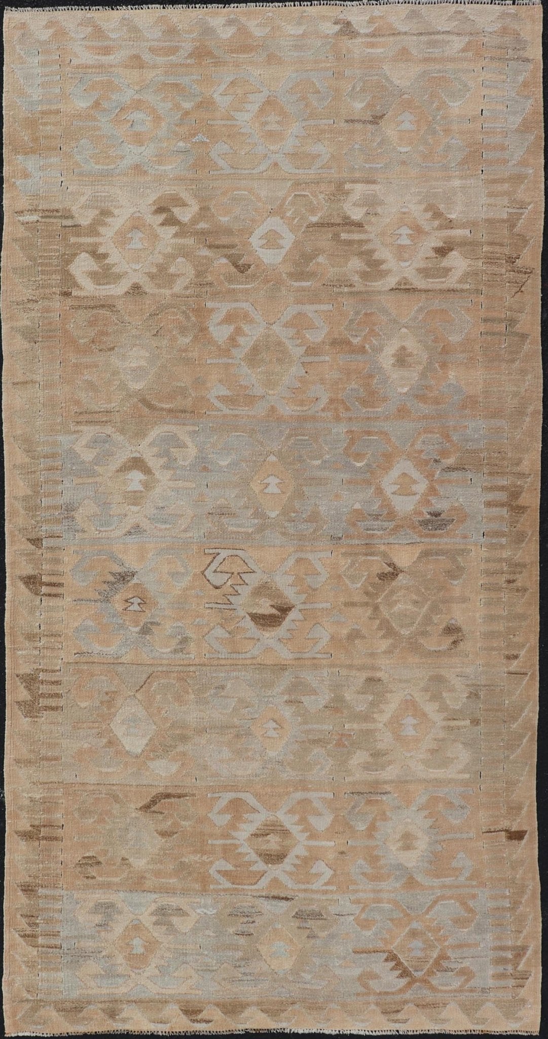 Gallery Turkish Vintage Flat - Weave Tribal Designed Kilim in Earthy Tones Measures: 5 x 10'1 This vintage Turkish flat weave Kilim features tribal relics and faded earthy neutrals. The repeating design covers the entire field of muted li... - Keivan Woven ArtsEN - 113 - 18782