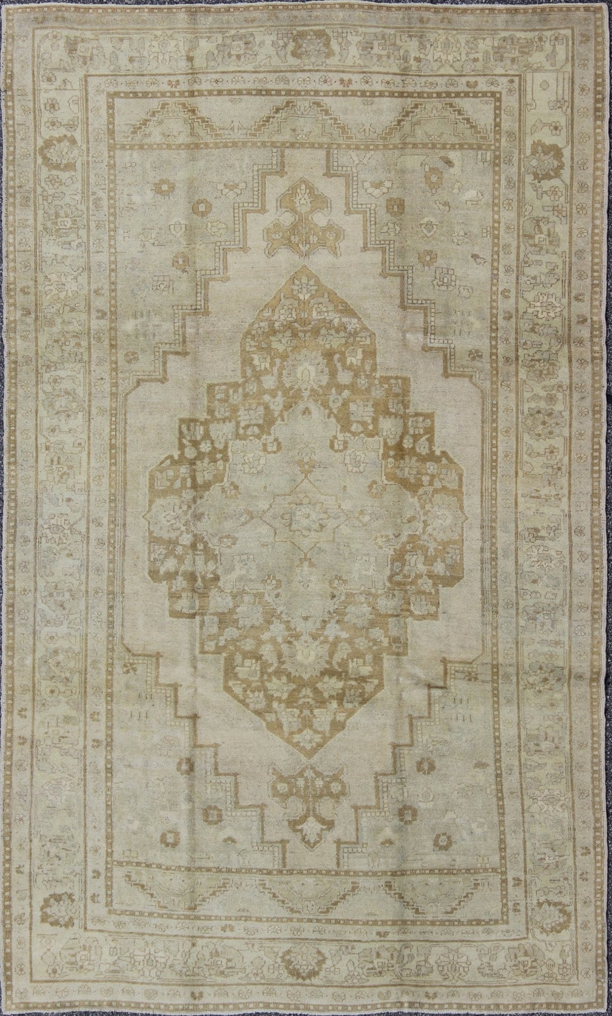 Vintage Turkish Oushak Rug Oushak rugs such as this vintage piece are highly decorative and desirable for their subduded and pale colors. The subdued color palette of soft gold, light brown, green, ivory and bone colors is enhanced by the partic... - Keivan Woven ArtsEN - 115378 - 3154Rug