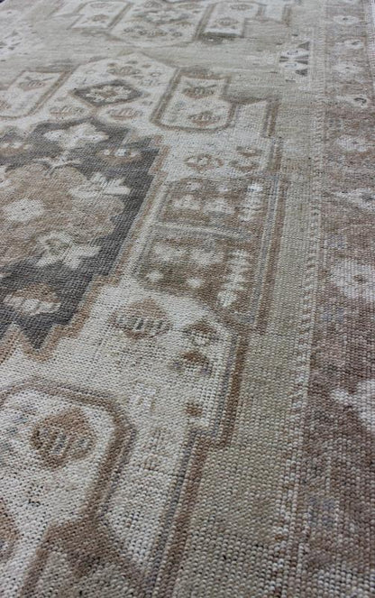 Turkish Oushak Runner with Central Medallion Design in Taupe, Charcoal and Gray kwarugs This Turkish vintage Oushak runner features a central medallion design as well as patterns of smaller botanical elements. Colors include various shades o... - Keivan Woven ArtsEN - 115826 - 2093Rug