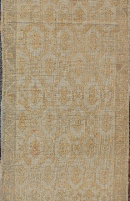 Muted Midcentury Turkish Oushak Runner with Latticework Design in Cream, yellow and taupe Measures: 3'3 x 8'7 Set on a cream - colored field with an all - over similarly - toned pattern, this beautiful midcentury Turkish Oushak rug (circa 1... - Keivan Woven ArtsEN - 115963 - 2077Rug
