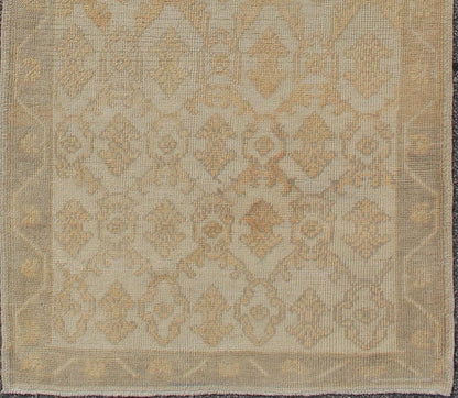 Muted Midcentury Turkish Oushak Runner with Latticework Design in Cream, yellow and taupe Measures: 3'3 x 8'7 Set on a cream - colored field with an all - over similarly - toned pattern, this beautiful midcentury Turkish Oushak rug (circa 1... - Keivan Woven ArtsEN - 115963 - 2077Rug