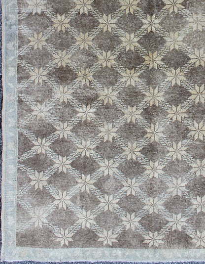 Midcentury Vintage Turkish Oushak Rug with Floral Latticework Pattern Measures: 5 x 7'10 The design of this beautiful vintage Oushak rug from mid - 20th century Turkey. The brown background is home to an all - over cream lattice design decor... - Keivan Woven ArtsEN - 115974 - 2071Rug
