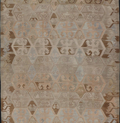 Vintage Hand - Woven Turkish Kilim Gallery Rug in Wool with Sub - Geometric Design This flat - weave tribal Turkish kilim has been hand - woven in wool. The rug features an all - over sub - geometric design, rendered in grays blues and earthy tones; making... - Keivan Woven ArtsEN - 122 - 19244
