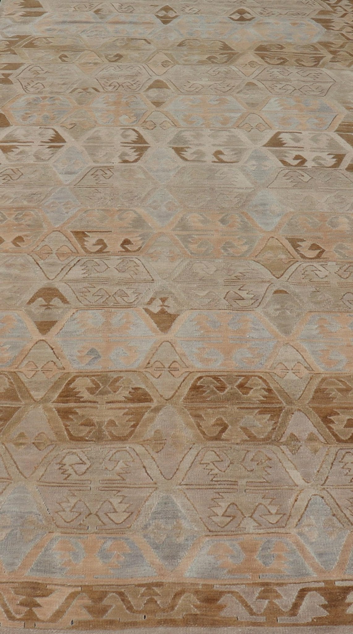 Vintage Hand - Woven Turkish Kilim Gallery Rug in Wool with Sub - Geometric Design This flat - weave tribal Turkish kilim has been hand - woven in wool. The rug features an all - over sub - geometric design, rendered in grays blues and earthy tones; making... - Keivan Woven ArtsEN - 122 - 19244