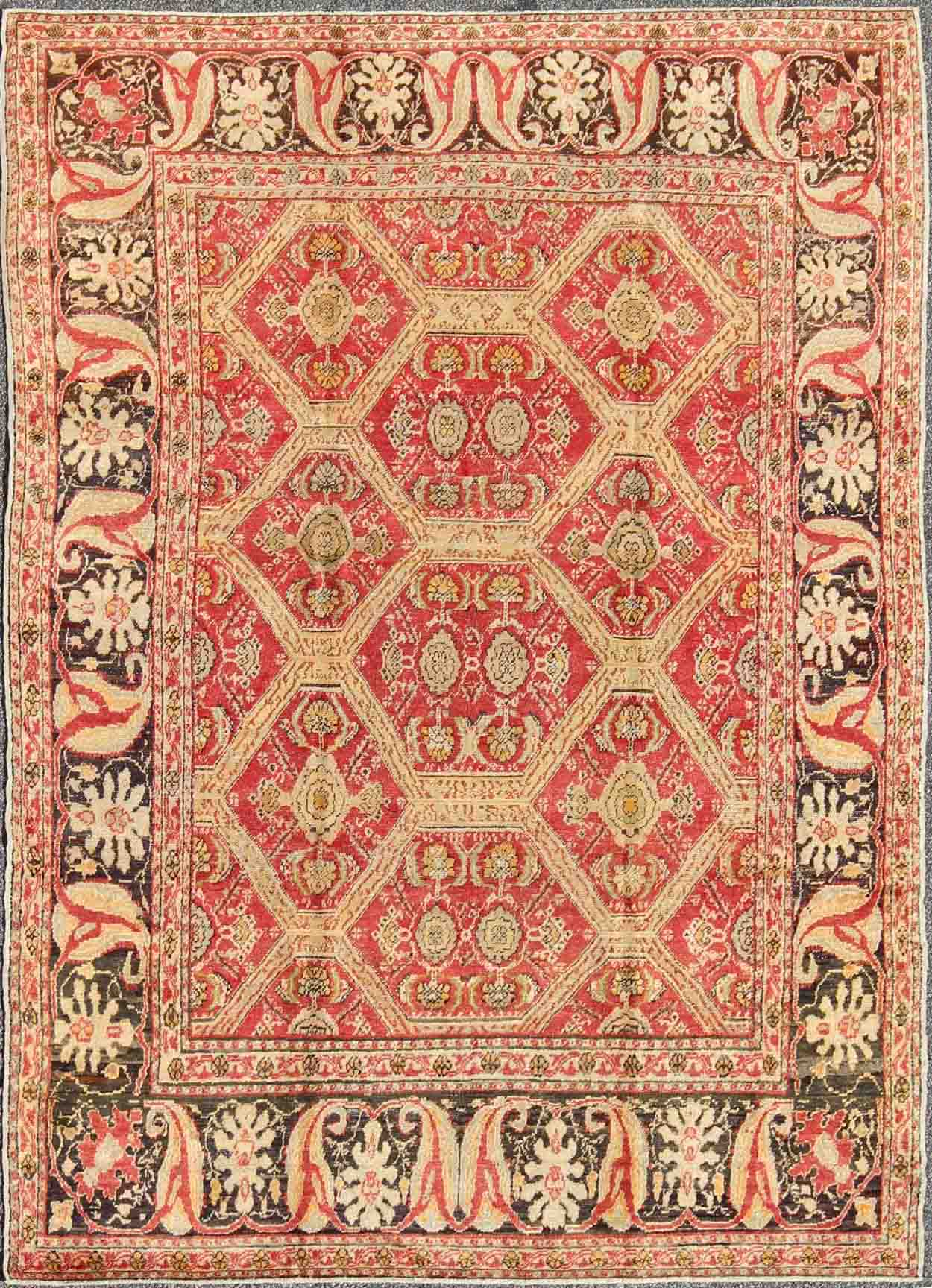 Antique Turkish Oushak Rug with Paisley Border and Over All Tribal Design Measures: 6'6 x 8'8' This magnificent Turkish rug displays a glorious coloration paired with superlative all - over sub - geometric design. The delightful hues of r... - Keivan Woven ArtsEN - 123987 - 7119Rug