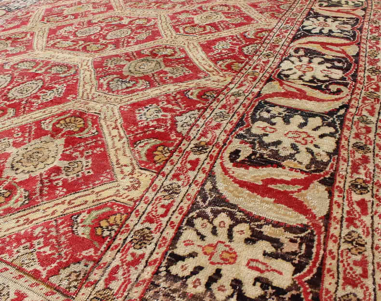 Antique Turkish Oushak Rug with Paisley Border and Over All Tribal Design Measures: 6'6 x 8'8' This magnificent Turkish rug displays a glorious coloration paired with superlative all - over sub - geometric design. The delightful hues of r... - Keivan Woven ArtsEN - 123987 - 7119Rug