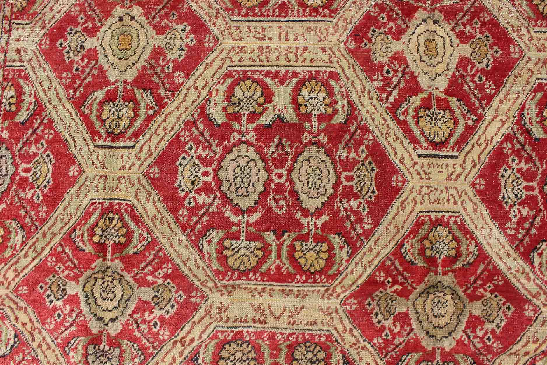 Antique Turkish Oushak Rug with Paisley Border and Over All Tribal Design Measures: 6'6 x 8'8' This magnificent Turkish rug displays a glorious coloration paired with superlative all - over sub - geometric design. The delightful hues of r... - Keivan Woven ArtsEN - 123987 - 7119Rug