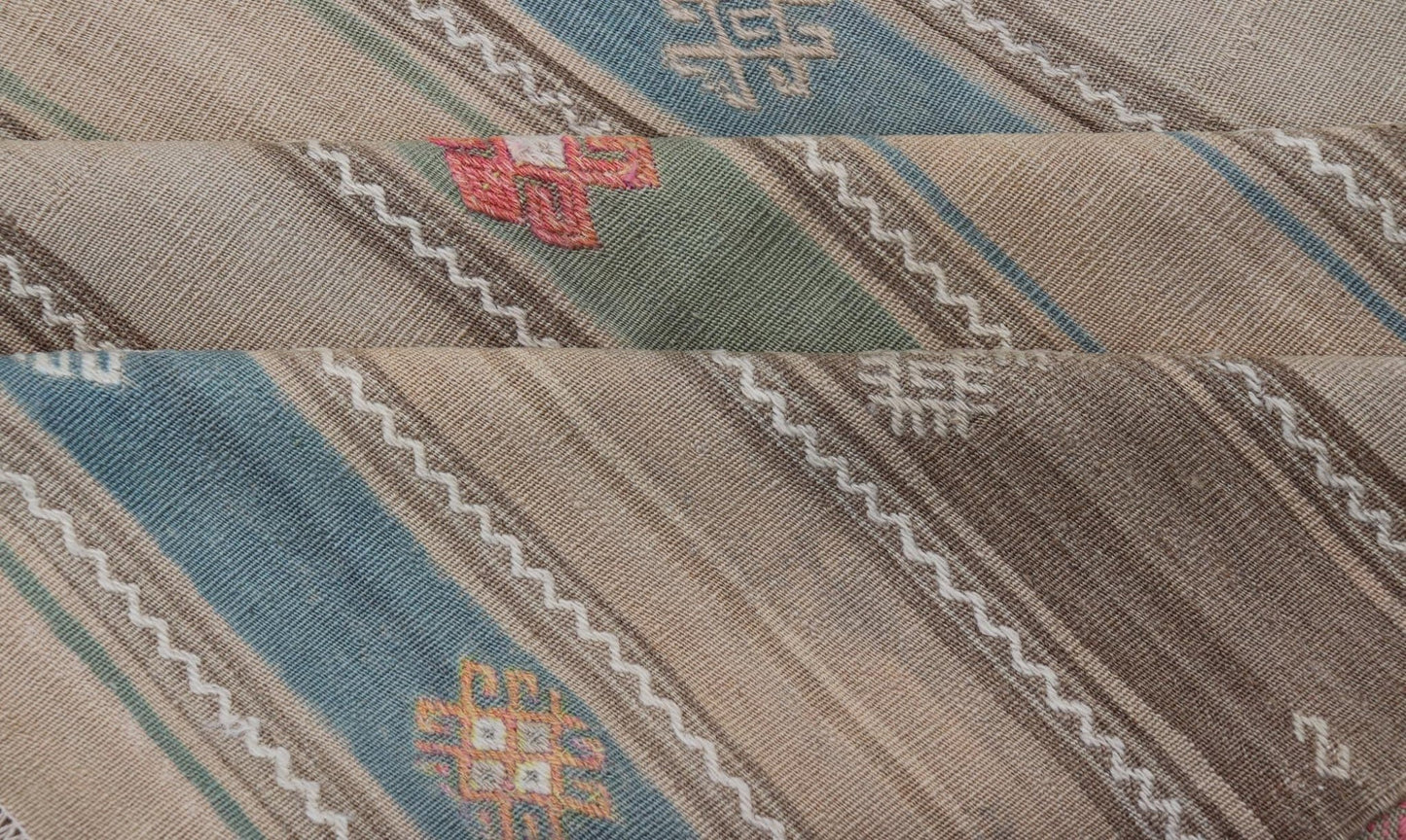 Vintage Hand - Woven Flatweave Kilim in Wool with Sub - Geometric Design and Motifs This flat - weave tribal kilim has been hand - woven in wool. The rug features a horizontal stripe design, accentuated by various sub - geometric motifs. The rug has been... - Keivan Woven ArtsEN - 13103 - 15725