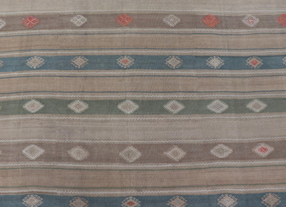 Vintage Hand - Woven Flatweave Kilim in Wool with Sub - Geometric Design and Motifs This flat - weave tribal kilim has been hand - woven in wool. The rug features a horizontal stripe design, accentuated by various sub - geometric motifs. The rug has been... - Keivan Woven ArtsEN - 13103 - 15725